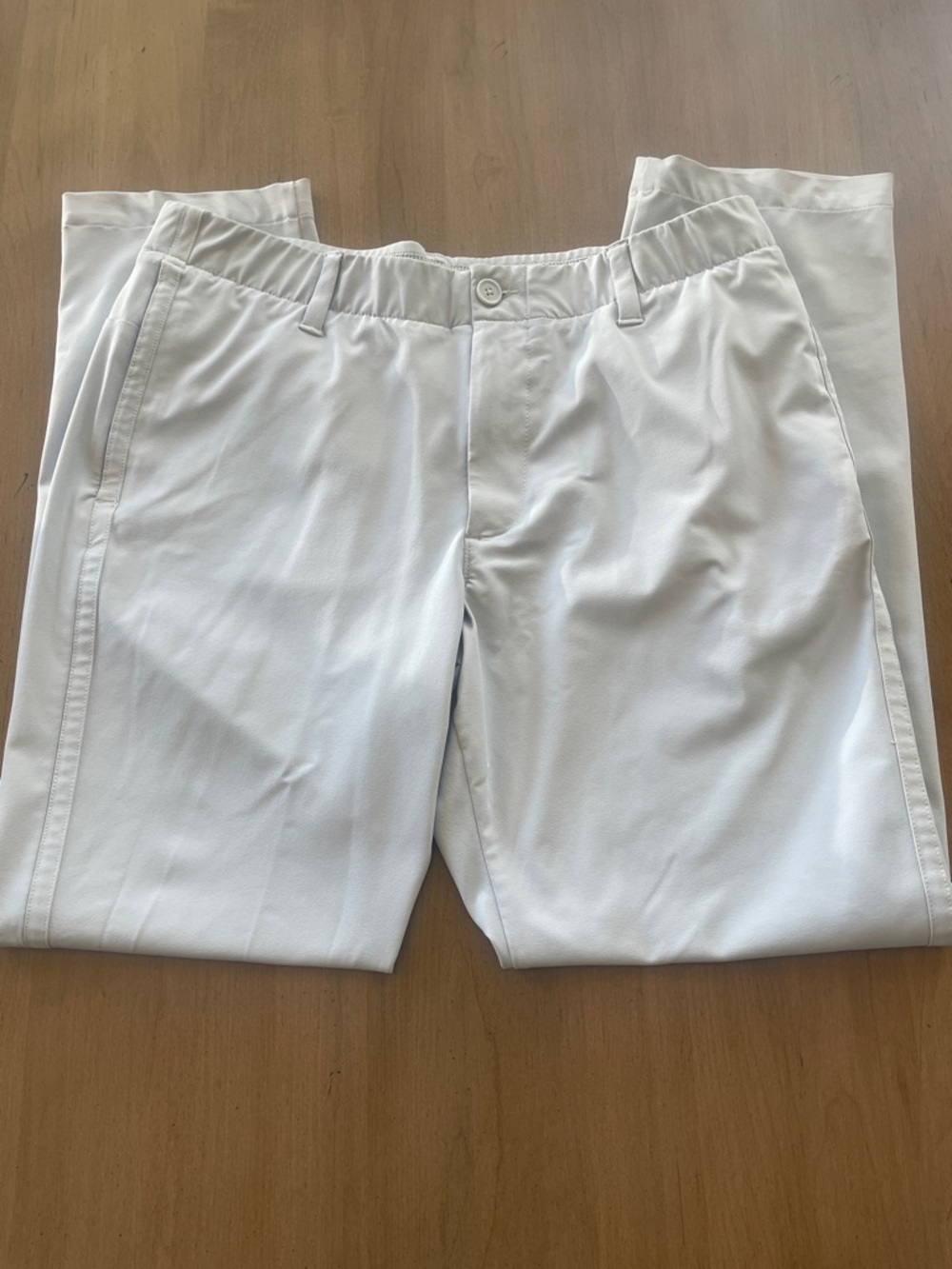 34/30 Under Armour pale gray (stone) golf/casual pants.  Very good condition!